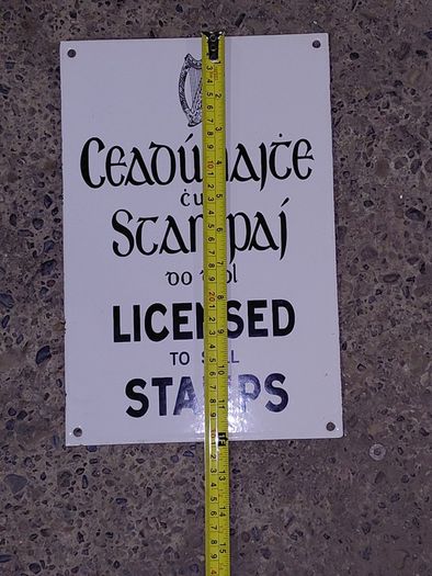 Irish antique style Enamel and Metal Sign. Licensed to Sell Stamps