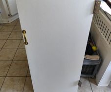 under stairs storage door