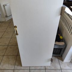 under stairs storage door