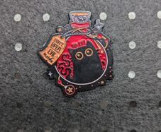 Evil cat enamel pin