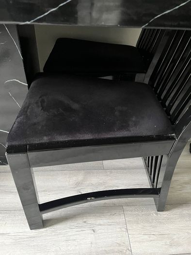 Table and chairs and glass cabinet