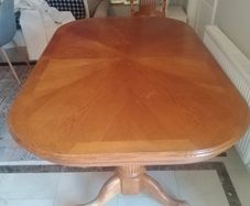large Extenable Solid Wooden Dining Room Table and Chairs