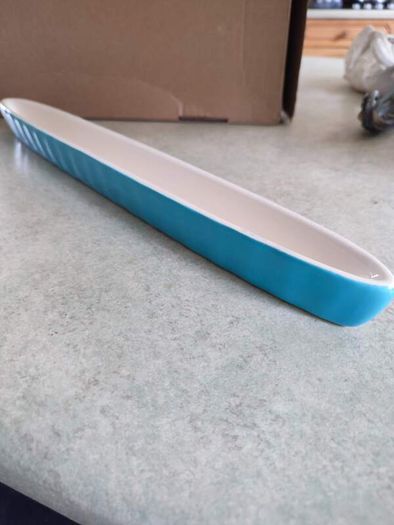 Olive boat This slim, elegant olive boat 41 cm. long.