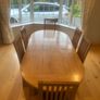 Kitchen table and 8 chairs Image 3