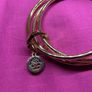 Newbridge Rose Gold Tone Triple Bangles Lotus charm Image 3
