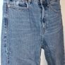 Distressed blue jeans Image 3