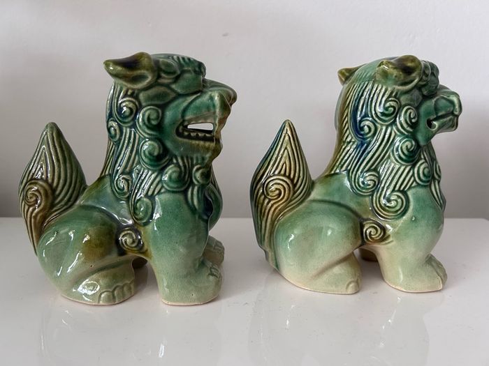 Two vintage Foo dogs in beautiful green glaze
