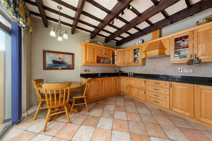 Solid Maple Kitchen, Black Granite Worktops & Premium Appliances (Neff/Bosch)