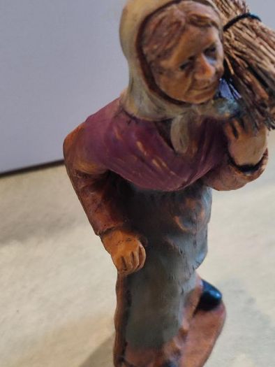 Vintage P. Maeder Lucerne Switzerland Wood Carving Of Woman  Holding Bundle Of Wood.