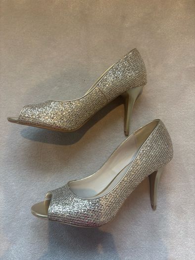 Gold glitter peep-toe heels.