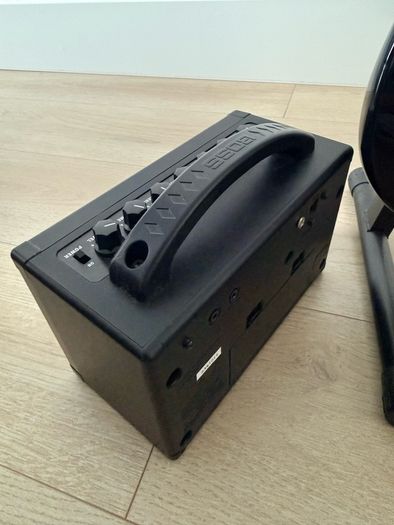 Squier stratocaster by fender, Boss amp and accessories