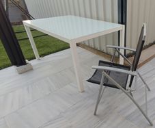 Glass garden table and 5 foldable chairs