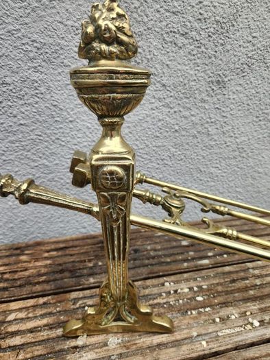 antique polished fire dog and irons
