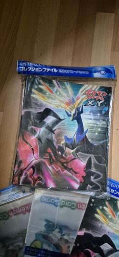 pokemon xy binder and 3 packets of inserts
