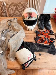 Go kart racing equipment - helmet, rainsuit, boots, gloves and more