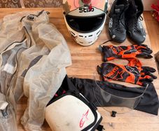 Go kart racing equipment - helmet, rainsuit, boots, gloves and more