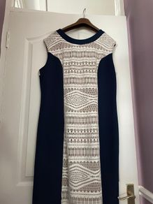Navy & Cream with intricate detail down front and shoulders