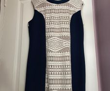 Navy & Cream with intricate detail down front and shoulders