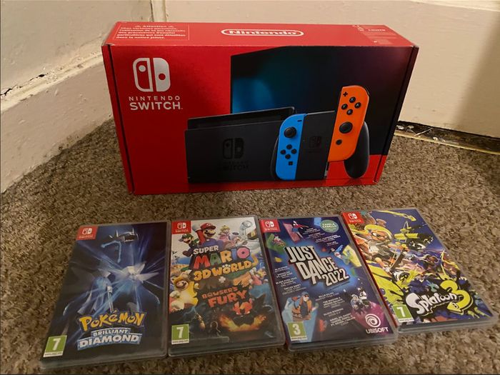 Nintendo Switch 32GB, Neon Red & Blue + 4 Games