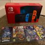 Nintendo Switch 32GB, Neon Red & Blue + 4 Games Image 2