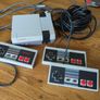 Retro NES loaded with games with 1 original controller and two super long cable controllers Image 2