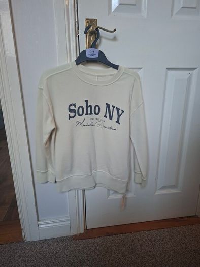 Brand new dunnes girls jumpers x2