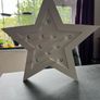 Cream wooden free standing star light Image 2