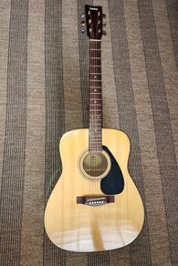 Yamaha F310 acoustic guitar + TKL HD gig bag