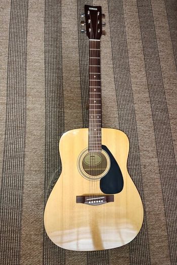 Yamaha F310 acoustic guitar + TKL HD gig bag