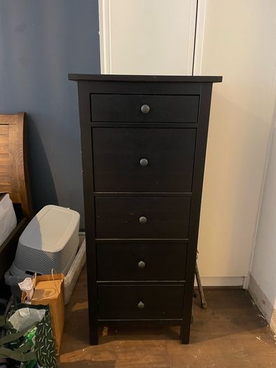 Black five-drawer chest of drawers