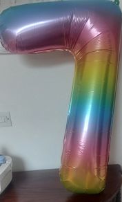 Large number 7 multi coloured air filled balloon