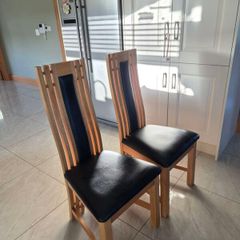 8 solid oak dining chairs