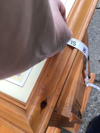 Padre Pio picture in wooden frame.