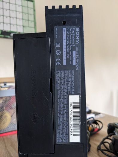 PS2 console with controller and cables