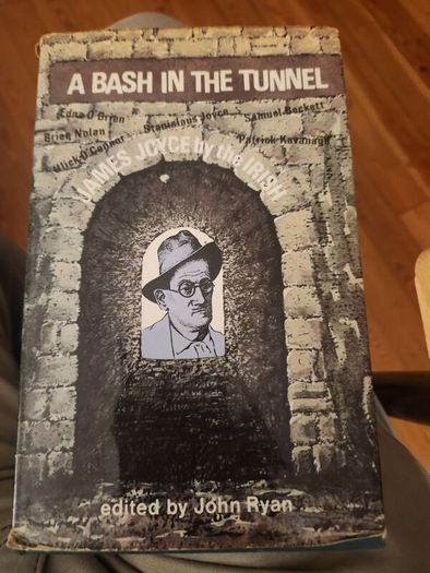 A Bash In The Tunnel. Edited By John Ryan. First Edition Hardback With Dustjacket In Good Condition.