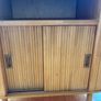 Fluted solid wood sideboard with sliding doors Image 2