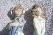 A pair of beautiful NAO (Lladro) hand-made porcelain figurines (1980s / 1990s). PRICE REDUCED