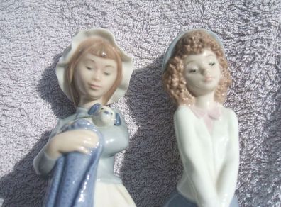 A pair of beautiful NAO (Lladro) hand-made porcelain figurines (1980s / 1990s). PRICE REDUCED