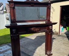 Mahogony fireplace surround and mirror