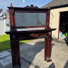 Mahogony fireplace surround and mirror