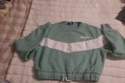 green/white ellesse crop sweater