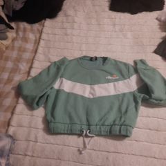 green/white ellesse crop sweater
