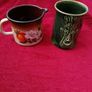 Retro Mid Century Milk pot or jug.  Enamel dark brown and orange with a floral pattern! Image 4