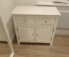 Cabinet. White Cabinet With Crystal Handles. 42 Inches High, 35 Inches Across And 18 Inches Deep.