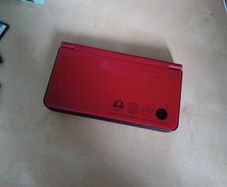 Limited Edition Super Mario Bros. 25th Anniversary DSi XL in Mario Red