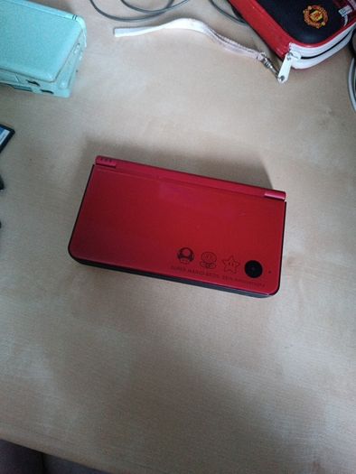 Limited Edition Super Mario Bros. 25th Anniversary DSi XL in Mario Red