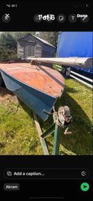 Boat with sails and trailer to pull it