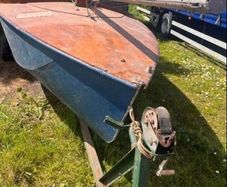 Boat with sails and trailer to pull it