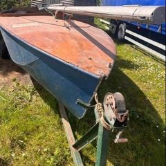 Boat with sails and trailer to pull it