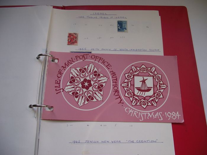 A collection of stamps from Isle of Man and Israel on albums pages (1950-1998) in the binder